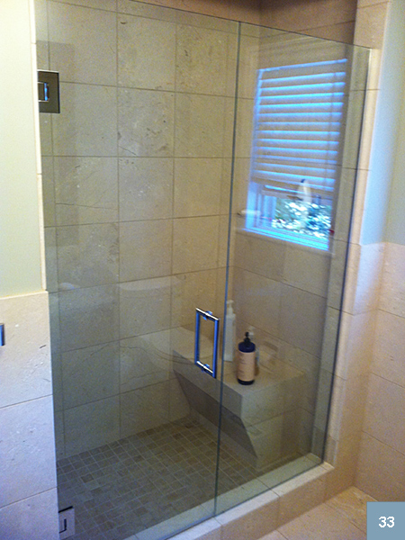 Shower with large tiles and seat