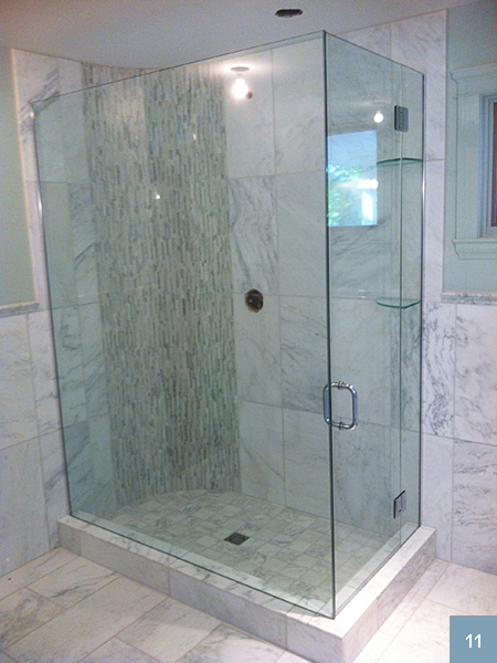 Glass shower and white marble